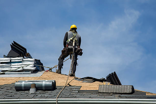 Professional Roof Replacement technician working in Yaphank, NY